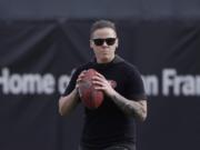 San Francisco 49ers offensive assistant Katie Sowers watches as players practice at the team&#039;s NFL football training facility in Santa Clara, Calif., Thursday, Jan. 23, 2020. The 49ers will face the Kansas City Chiefs in Super Bowl 54.