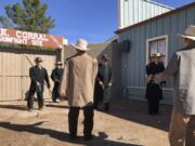 Life-sized replicas of the men who took part in a famous shootout in Tombstone, Ariz., are seen at the OK Corral in Tombstone on Saturday, Nov. 30, 2019. The men, lawmen and cowboys, are positioned as they were during the confrontation that left three dead and became one of the most famous shootouts in the Old West.