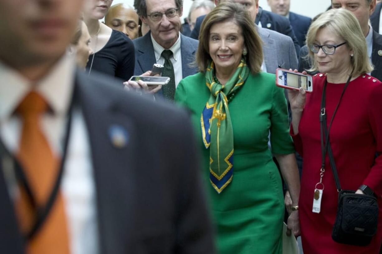 Speaker of the House Nancy Pelosi, D-Calif., leaves a meeting with the Democratic Caucus at the Capitol in Washington, Tuesday, Jan. 14, 2020.