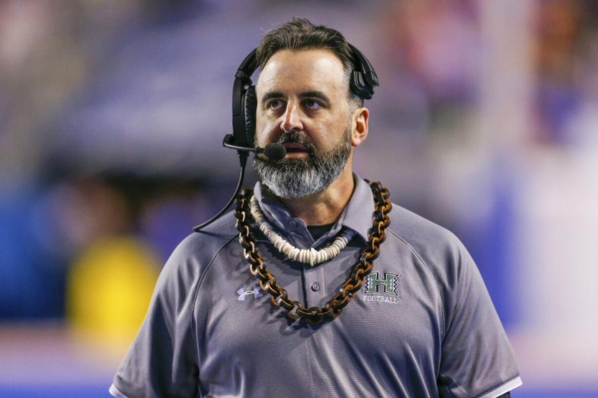 Hawaii head coach Nick Rolovich walks the sideline during a game against Boise State. Washington State will introduce Rolovich as the Cougars&#039; head football coach on Thursday.