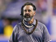 Hawaii head coach Nick Rolovich walks the sideline during a game against Boise State. Washington State will introduce Rolovich as the Cougars&#039; head football coach on Thursday.