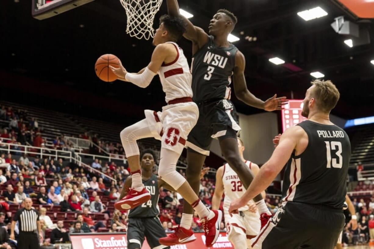 Stanford guard Tyrell Terry, left, shoots as Washington State forward Daron Henson (3) defends during the first half of an NCAA college basketball game Saturday, Jan. 11, 2020, in Stanford, Calif.