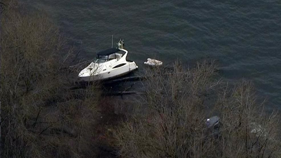 A 36-foot Carver cabin cruiser stolen from a marina in Washougal rests in the Columbia River near Ridgefield where it was run ashore on Tuesday.