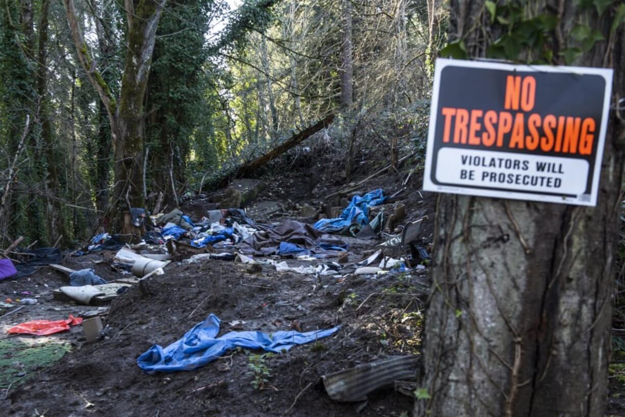 An abandoned campsite is seen Monday afternoon in the woods of north Hazel Dell.