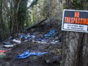 An abandoned campsite is seen Monday afternoon in the woods of north Hazel Dell.