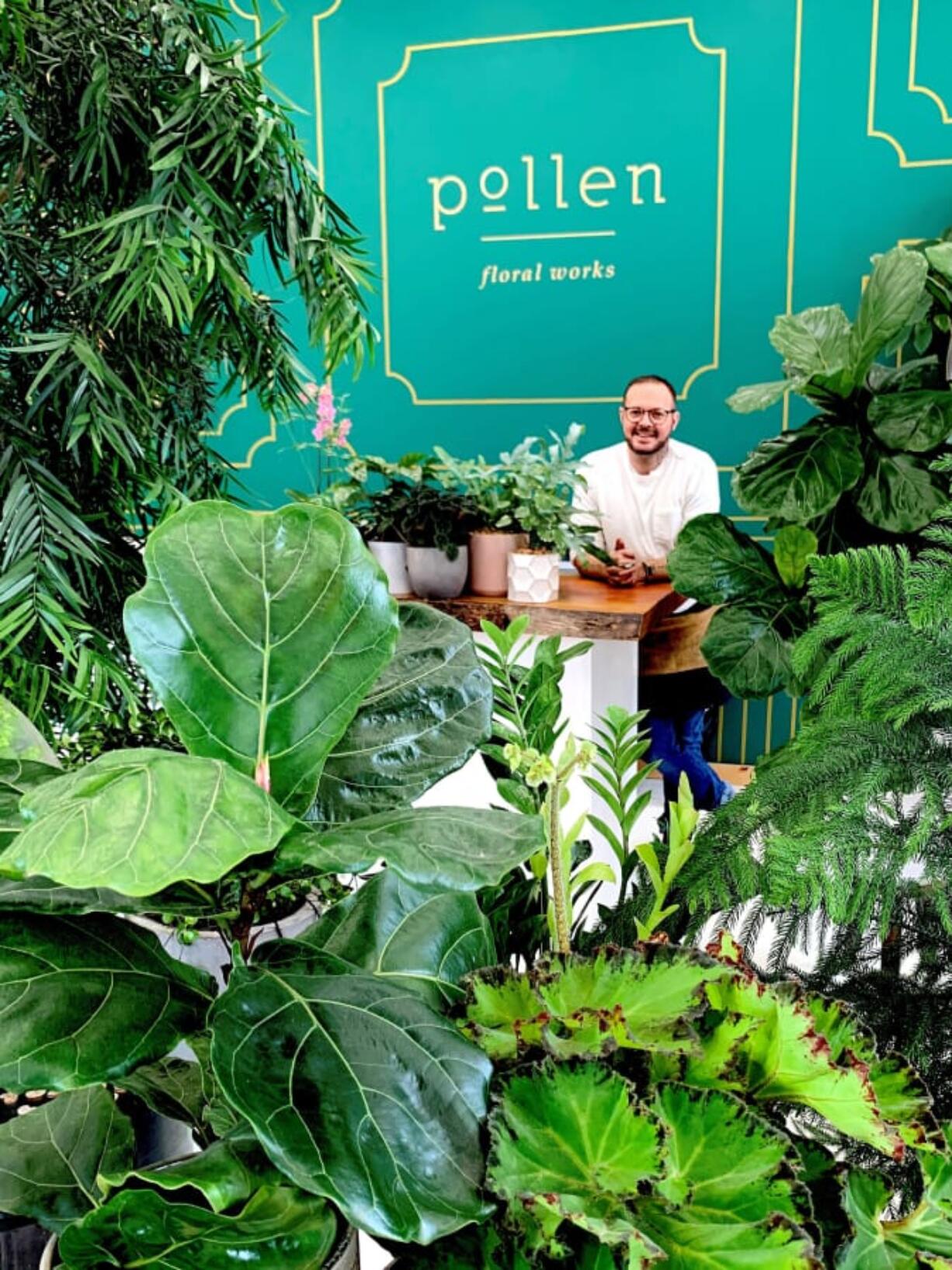 Florist Jason Vorse stands in his Castle Rock shop Pollen Floral Works.