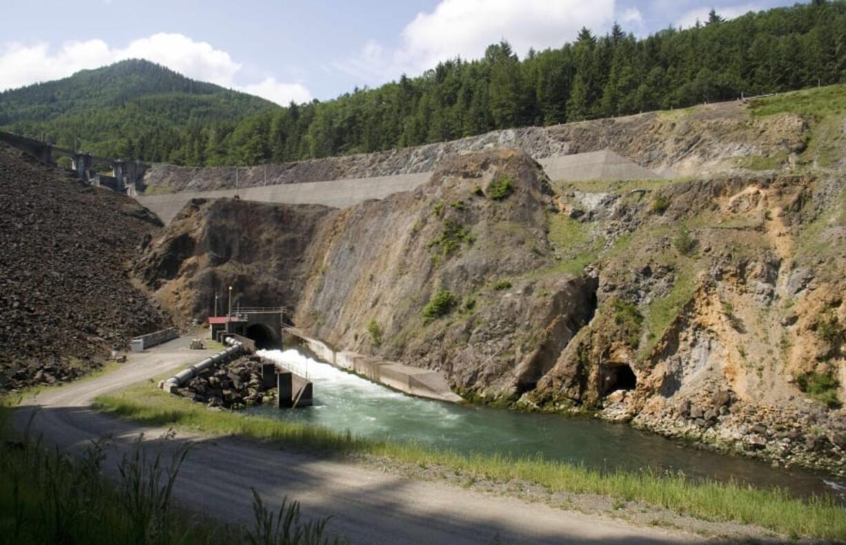 Water flows from the Howard Hanson Dam in June 2009 in East King County.