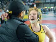 Hudson&#039;s Bay&#039;s Allison Blaine celebrates her third state title, a 15-4 decision victory in the 135-pound girls finals.