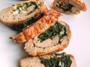 Pork loin stuffed with goat cheese and spinach is an elegant -- and easy -- weeknight meal.