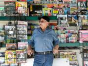 A newsstand in the Boyle Heights neighborhood of Los Angeles has survived for decades in a time when technology is taking over news consumption. But the tech is catching up to them and now they hardly make a profit. Rafael Ramos, above, bought the stand 25 years ago and is likely closing it this year after the man who runs it retires.