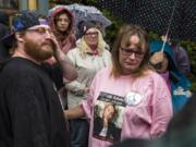 Jeremiah Anderson, left, and his aunt Lisa Woods become emotional after they hug one another outside the Clark County Courthouse the morning of Jan. 2. Superior Court Judge David Gregerson had set $750,000 bail for David Y. Bogdanov in the slaying of Woods&#039; daughter, transgender Vancouver teen Nikki Kuhnhausen.