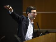 Washington State Attorney General Bob Ferguson speaks about the state&#039;s lawsuit against Motel 6 for their practice of sharing guest&#039;s names with U.S. Immigration and Customs Enforcement during The Columbian&#039;s &quot;Bridging the Border&quot; forum at the Vancouver Community Library on Thursday.