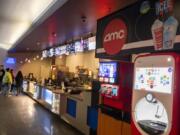 AMC&#039;s updated concession counter at the Vancouver Mall theater includes the multiplex chain&#039;s &quot;Feature Fare&quot; food menu and new Coca-Cola &quot;Freestyle&quot; fountains.