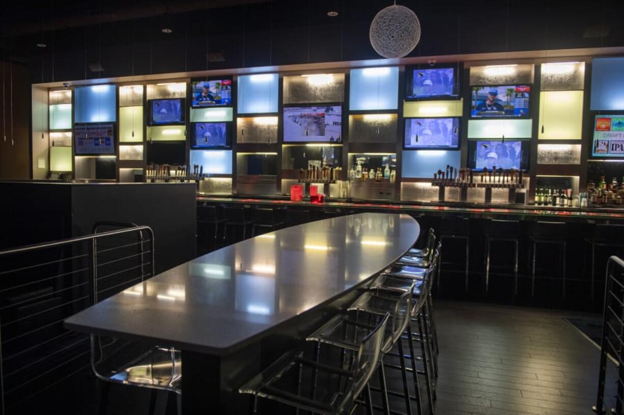 MacGuffins Bar on the second-floor section of the AMC Vancouver Mall 23 theater serves alcoholic drinks that customers can drink on-site or take into the auditoriums. The bar, formerly known as Brewtopia, returned in December following a six-month closure due to licensing delays.