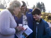 Washougal Mayor Molly Coston, left, talks with DeeAnna Janku, development representative for St. Jude Children&#039;s Research Hospital, and Janku&#039;s son Gideon during the groundbreaking for a St. Jude Dream Home in Washougal. Gideon was diagnosed with a rare form of melanoma and does checkups with St. Jude in Tennessee. The house will be built without cost to St. Jude, but all proceeds from the sale will benefit the hospital. Gideon turns 10 on Saturday.