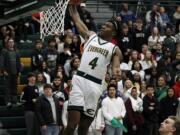 Evergreen&#039;s Zyell Griffin goes up for a dunk vs. Peninsula in a winner-to-state game in the 3A boys basketball bi-district tournament on Saturday night, Feb. 15, 2020.