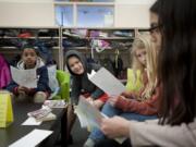 From left, fifth-graders Harlem Hotchkins, 10, Jonathon Yost, 10, Emma Mosbrucker, 11, and Arwa Al Robiai, 10, join in discussion during the Columbia Valley Elementary School Civil Rights Book Club. Students Beth Petrie&#039;s and Kari McArthur&#039;s classes read books about the civil rights movement of the 1960s and kept diaries written in the voices of the books&#039; main characters.