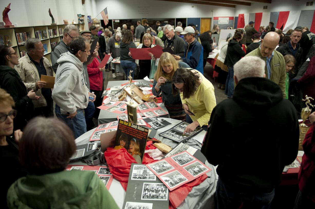 Hundreds of former students and faculty gathered at McLoughlin Middle School and George C. Marshall Elementary School on Saturday to share memories and bid the buildings farewell. The school buildings are slated to be torn down and replaced later this year.