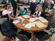 Clark County Republican Party voters gather Saturday for the GOP caucus. Attendees chose delegates to represent their precincts at the county convention in April.