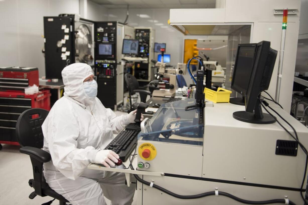 nLIGHT engineering technician Erica Williams works on a qualifying tool for production use at nLIGHT in Vancouver in April 2018.