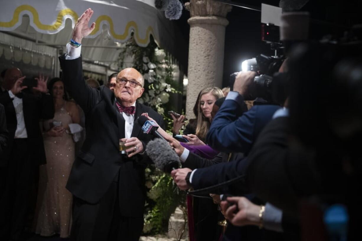 Former New York Mayor Rudy Giuliani, an attorney for President Donald Trump, speaks to reporters as he arrives for a New Year&#039;s Eve party hosted by President Donald Trump at his Mar-a-Lago property, Tuesday, Dec. 31, 2019, in Palm Beach, Fla.