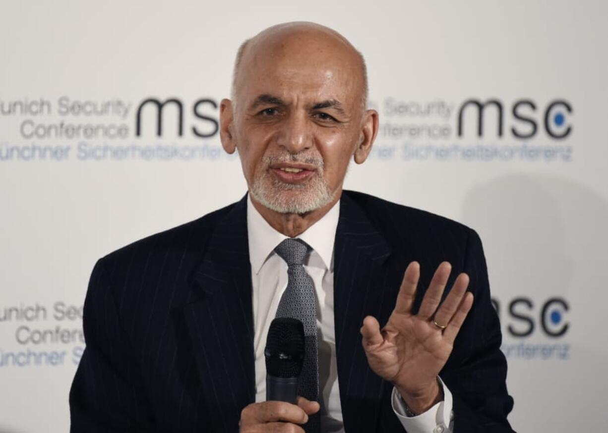 In this Saturday, Feb. 15, 2020 file photo, Afghan President Ashraf Ghani speaks at the Munich Security Conference, in Munich, Germany. The Afghan Independent Election Commission said Tuesday, Feb. 18, 2020, that President Ashraf Ghani has won a second term as president.