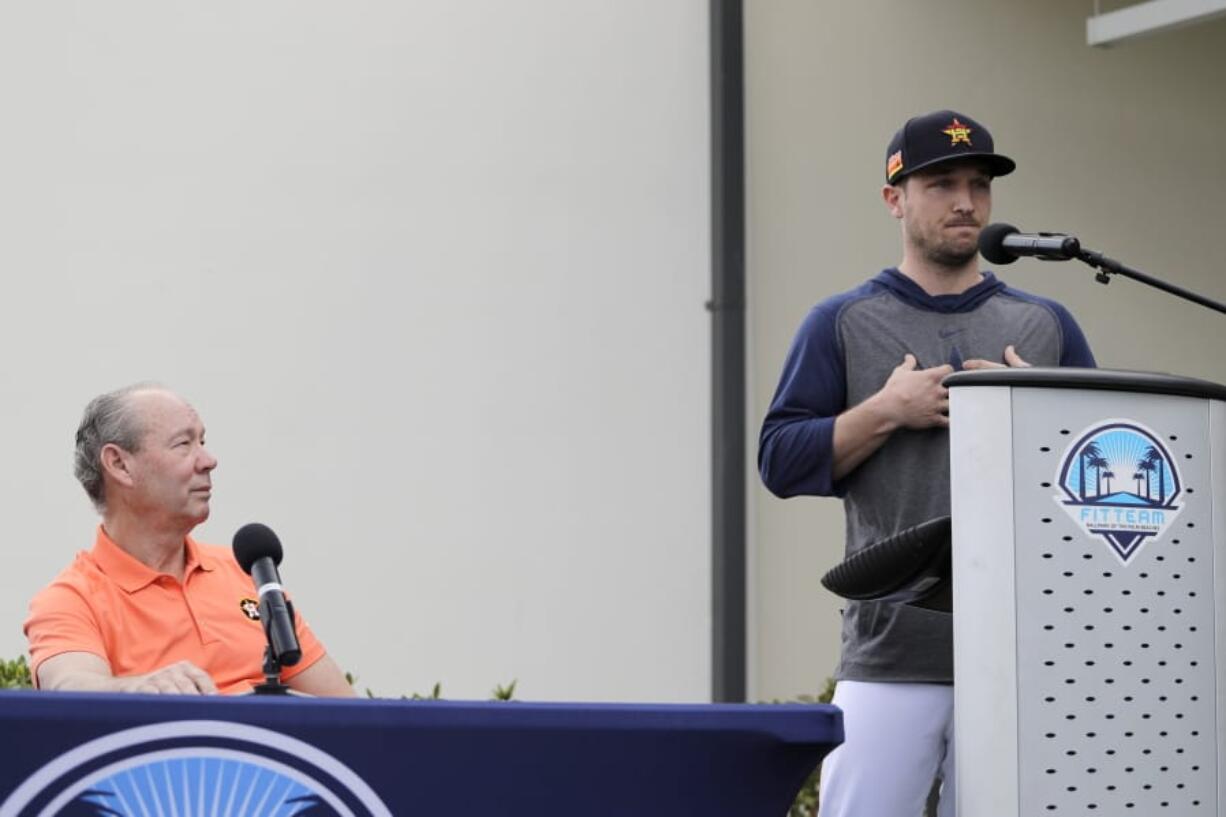 Houston Astros manager Dusty Baker, left, and owner Jim Crane speak during a news conference before the start of the first official spring training baseball practice for the team Thursday, Feb. 13, 2020, in West Palm Beach, Fla.