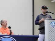 Houston Astros manager Dusty Baker, left, and owner Jim Crane speak during a news conference before the start of the first official spring training baseball practice for the team Thursday, Feb. 13, 2020, in West Palm Beach, Fla.