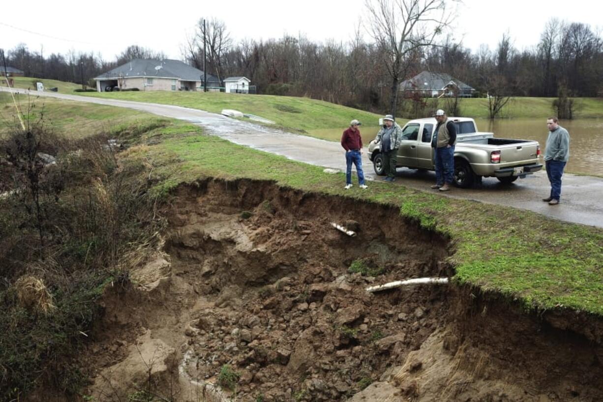 Area officials monitor a potential dam/levee failure Feb. 11 in the Springridge Place subdivision in Yazoo County, Miss. Heavy rains and recent flooding across the Southeastern U.S. have highlighted a potential public safety concern for some dams.