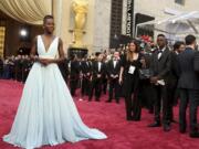 Lupita Nyong&#039;o in a pale blue Prada dress at the Oscars on March 2, 2014, in Los Angeles.