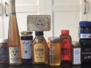 This February 24, 2020 photo taken in New York, shows some of the many brands and types of honey available today. Honey isn&#039;t just honey anymore. At farmers markets, grocery stores and restaurants, there&#039;s a wide assortment of honeys with various colors and tastes.