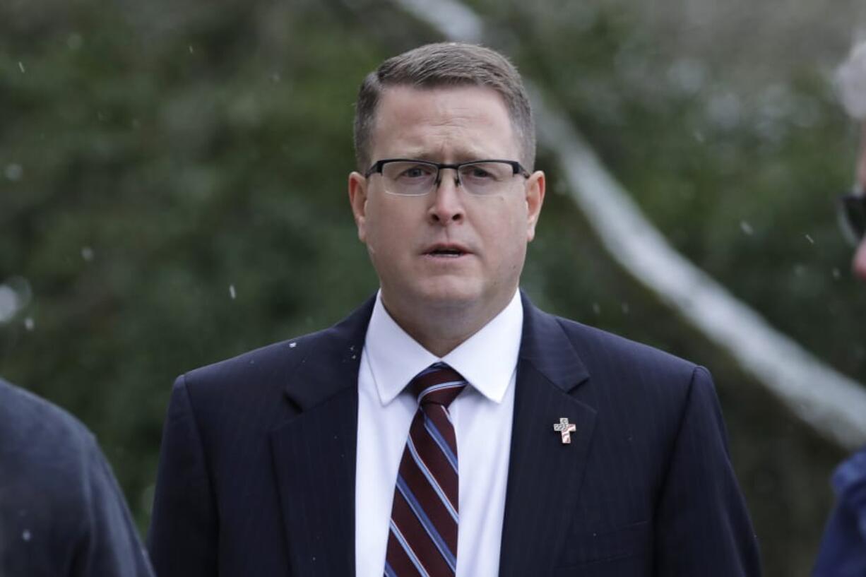 This Jan. 15, 2020, photo shows Rep. Matt Shea, R-Spokane Valley, during a rally held by "My Family My Choice," an organization opposed to government regulations affecting schools and child-raising the Capitol in Olympia. (Ted S.