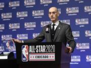 NBA Commissioner Adam Silver unveils the NBA All-Star Game Kobe Bryant MVP Award during a news conference Saturday, Feb. 15, 2020, in Chicago.