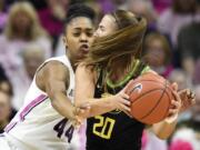 Connecticut&#039;s Aubrey Griffin, left, pressures Oregon&#039;s Sabrina Ionescu, right, in the first half of an NCAA college basketball game, Monday, Feb. 3, 2020, in Storrs, Conn.