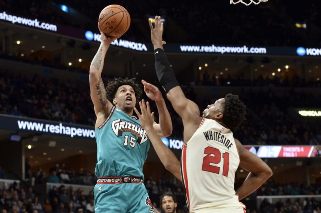 Memphis Grizzlies forward Brandon Clarke (15) shoots against Portland Trail Blazers center Hassan Whiteside.