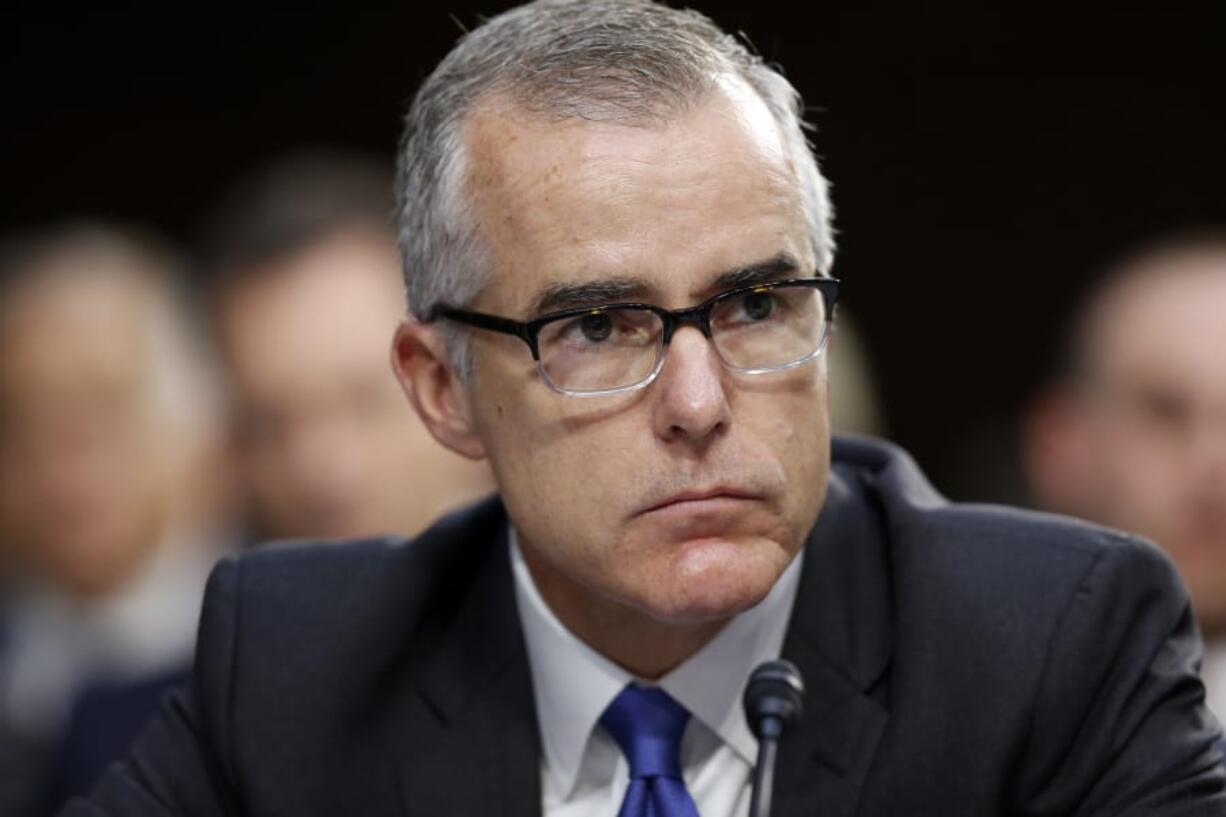 FILE - In this June 7, 2017, file photo, then FBI Acting Director Andrew McCabe listens during a Senate Intelligence Committee hearing on Capitol Hill in Washington.