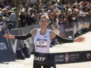 Galen Rupp crosses the finish line to win the U.S. Olympic marathon trials, Saturday, Feb. 29, 2020, in Atlanta.