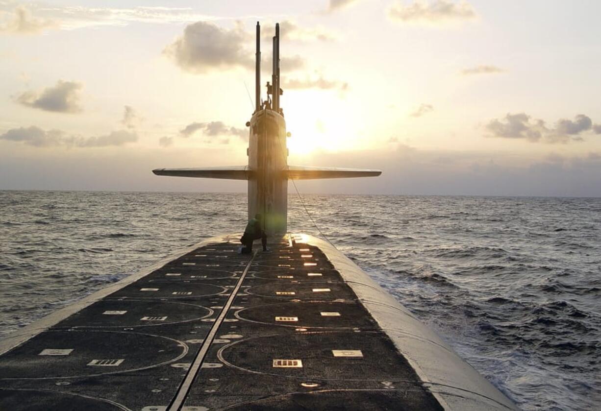 FILE - In this Jan. 9, 2008 photo released by the U.S. Navy, The Ohio-class ballistic-missile submarine USS Wyoming approaches Naval Submarine Base Kings Bay, Ga. The Pentagon&#039;s top policy official tells The Associated Press that the United States for the first time has deployed the newest addition to its nuclear arsenal -- a submarine-launched weapon that the Trump administration says will make nuclear war less likely.  (Lt. Rebecca Rebarich/U.S.