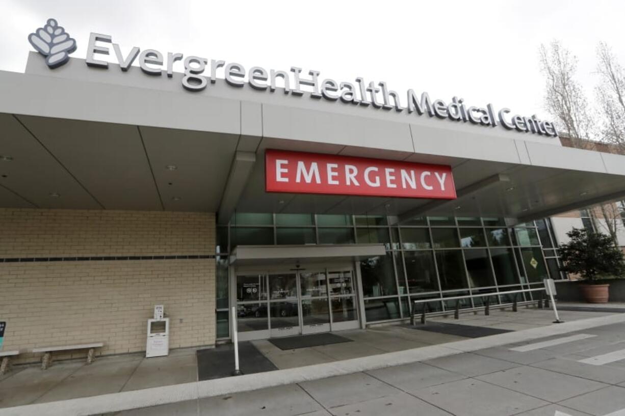 EvergreenHealth Medical Center is seen Saturday, Feb. 29, 2020, where a person died of COVID-19, in Kirkland, Wash. State health officials announced the death Saturday, marking the first such reported death in the United States. State officials issued a terse news release announcing the death, and gave no details before a scheduled news conference later in the day.