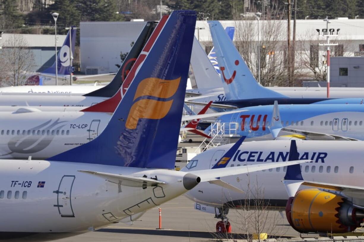 Grounded Boeing 737 MAX airplanes fill a parking area adjacent to Boeing Field, Wednesday, Feb. 19, 2020, in Seattle. Washington state lawmakers say they will introduce bills, at The Boeing Co.&#039;s request, to suspend the aerospace giant&#039;s preferential business and occupation tax rate until the United States and European Union resolve their long-running international trade dispute.