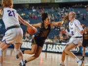 Hudson's Bay's Mahaila Harrison drives to the basket in a 3A round-of-12 game Wednesday at the Tacoma Dome.