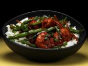 Spicy chile crisp is an great way to punch up a chicken dinner. Try this recipe for chile crisp chicken with shallots and green beans.