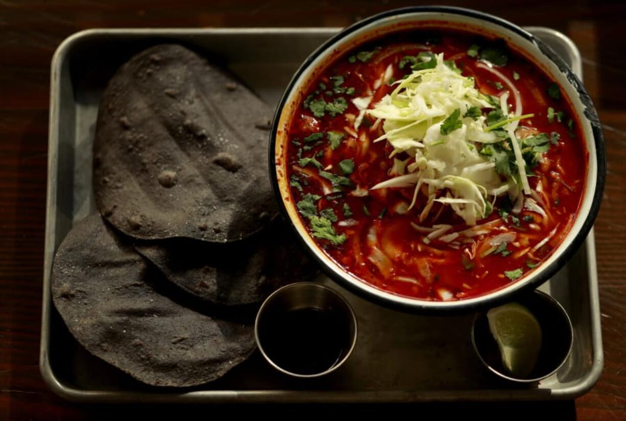 Chef Monica Dimas&#039; recipe for the rich, spicy posole she serves at her Seattle restaurant Little Neon Taco makes a ton - plenty to eat now and also freeze for more comfort later.