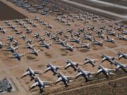 Planes from various airlines sit in storage at a &quot;boneyard&quot; facility March 28, 2019, beside the Southern California Logistics Airport in Victorville, Calif.