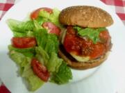 Pizza-flavored chicken burgers and salad.