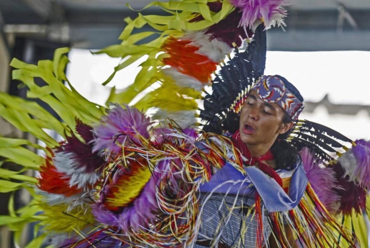 Justice Florendo, 17, decked out in Fancy Dance regalia, will be the head male dancer at the upcoming Traditional Pow Wow at Heritage High School.