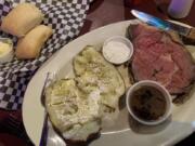 Slow Roasted Prime Rib and rolls at Billygan&#039;s Roadhouse.