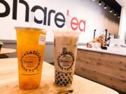 A Hawaii Fruit Tea with Aiyu Jelly and a Classic Pearl Milk Tea with black tea at Sharetea in Hazel Dell.