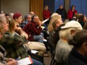 The public listens to citizen testimony on the Heights District Plan on Monday at Vancouver City Hall. It was a packed room, with many residents of neighborhoods surrounding the Heights District attending to share their thoughts on the development proposal.