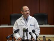 Dr. Lawrence Neville, chief medical officer at PeaceHealth Southwest, speaks during a COVID-19 press conference at the Clark County Public Service Center on Friday, March 13, 2020.